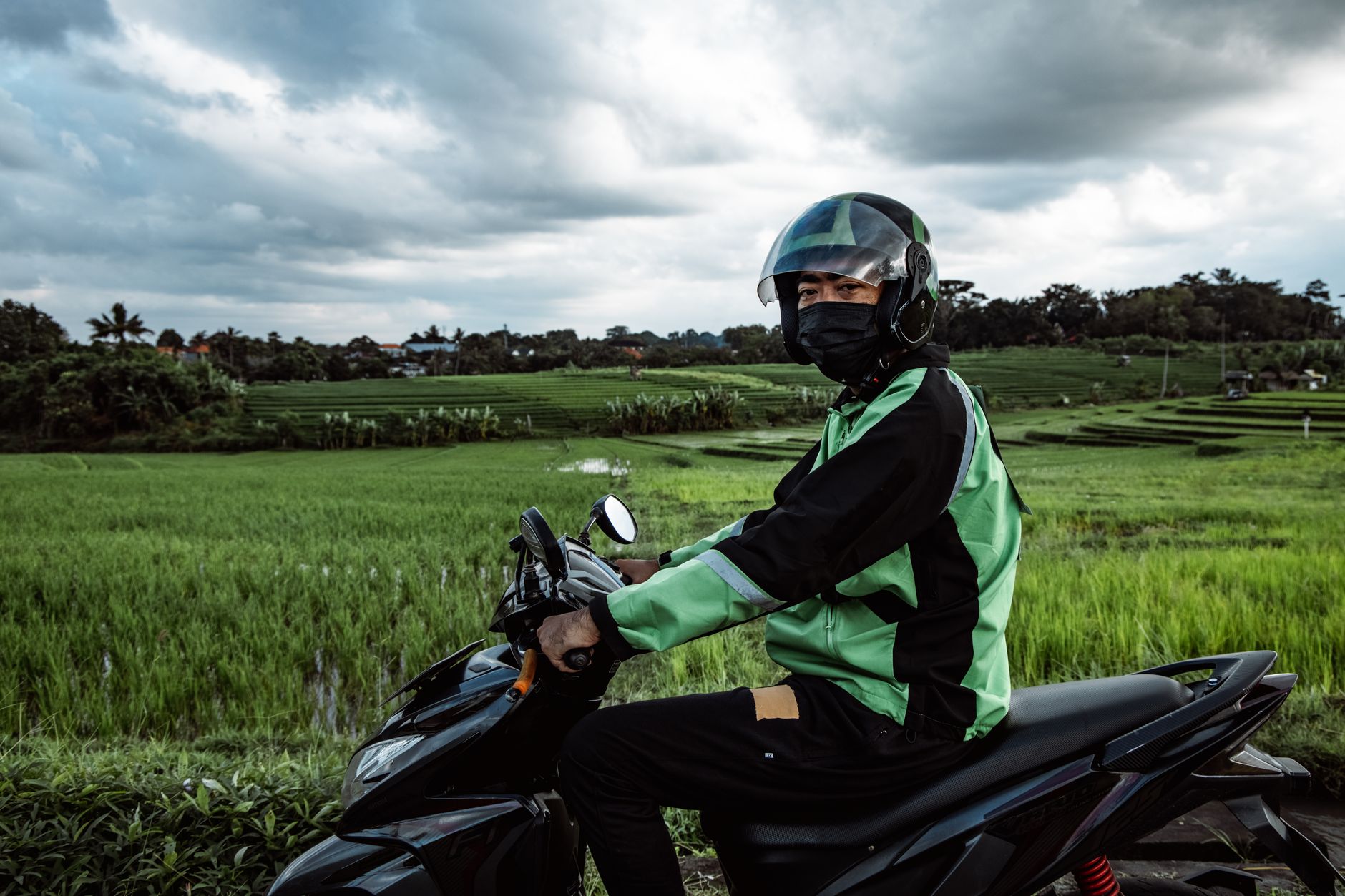 Scooter parked in rural Bali village